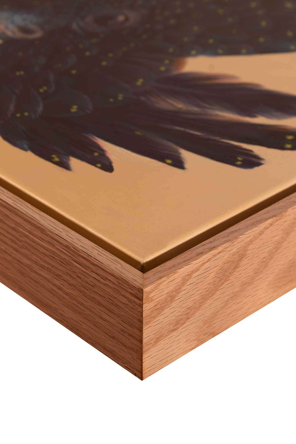 Close up of the oak float frame of hidden red tail original painting