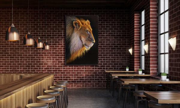 Original painting of lion 'Tactical Gaze' by Swapnil Nevgi shown in a commercial setting