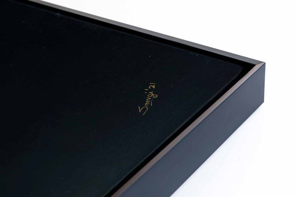 Close up of the frame of an original oil painting Le Magnifique