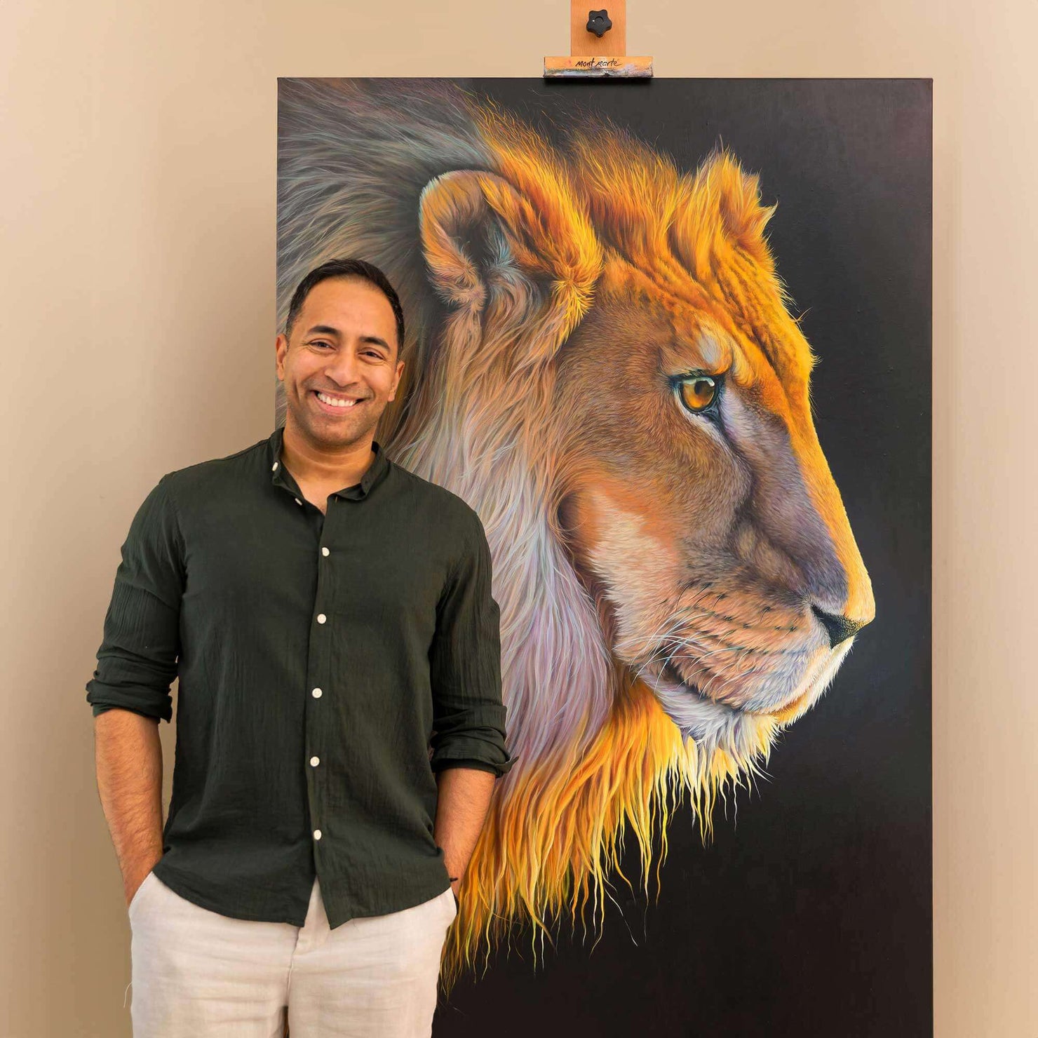 Tactical gaze original painting of the lion with the artist Swapnil Nevgi