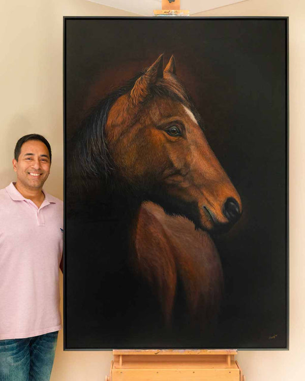original oil painting Le Magnifique of a horse shwon next to the artist to give perspective of the size of the painting