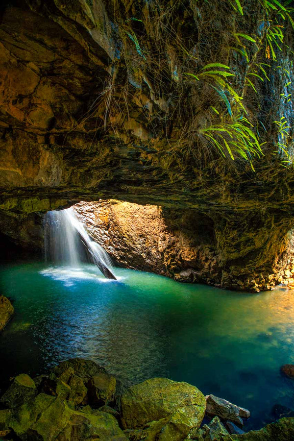 Fine art  photography print of a waterfall at Springbrook, Qld, known as Natural Bridge.