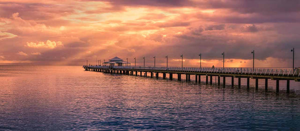 Fine art photography print of Shorncliffe pier on a stormy day at the sunrise